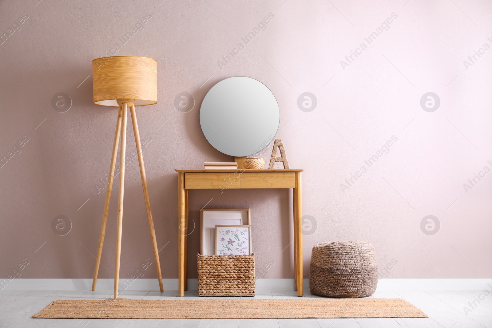 Photo of Elegant room interior with console table and floor lamp