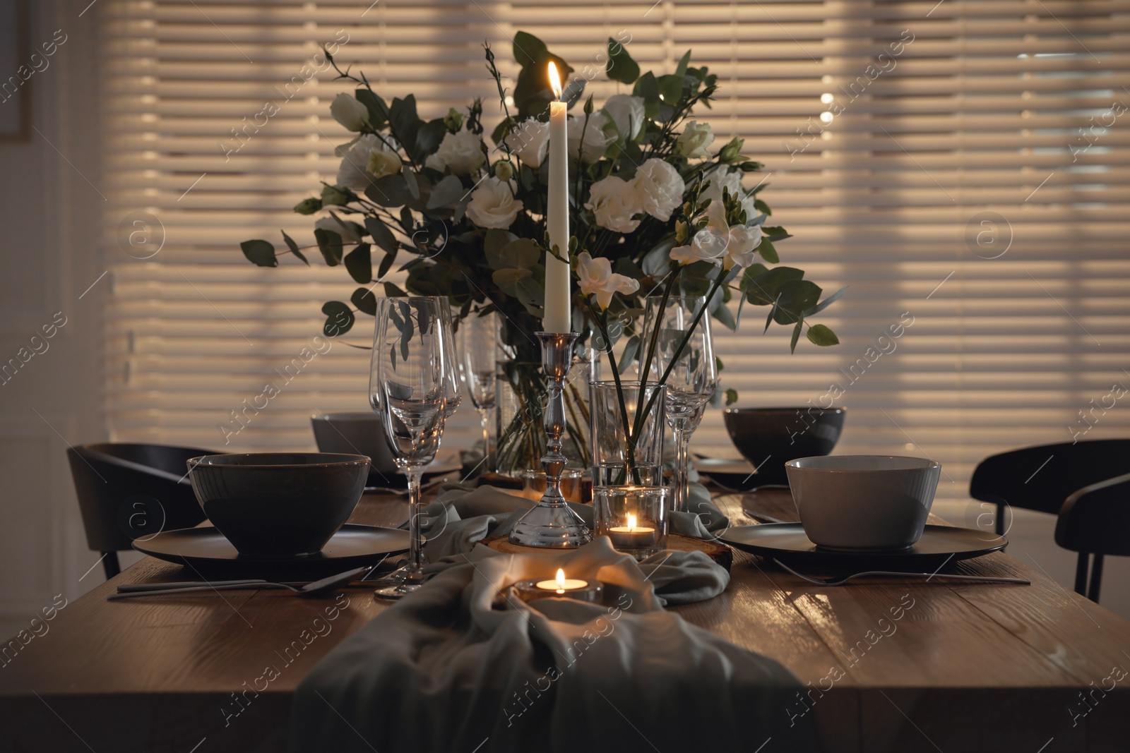 Photo of Festive table setting with beautiful tableware and decor indoors