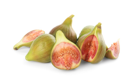 Photo of Whole and cut tasty figs isolated on white