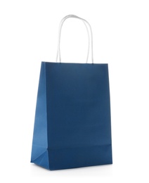 Photo of Mockup of paper shopping bag on white background