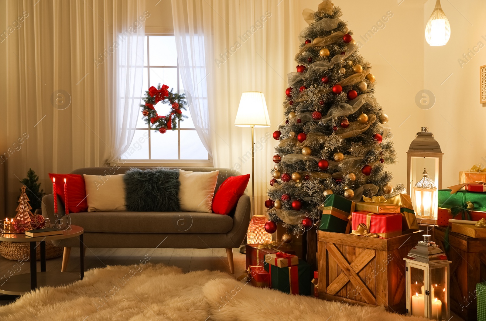 Image of Beautiful Christmas tree in living room. Festive interior