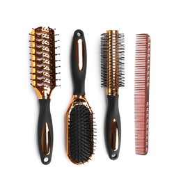 Set of modern hair brushes and comb isolated on white, top view