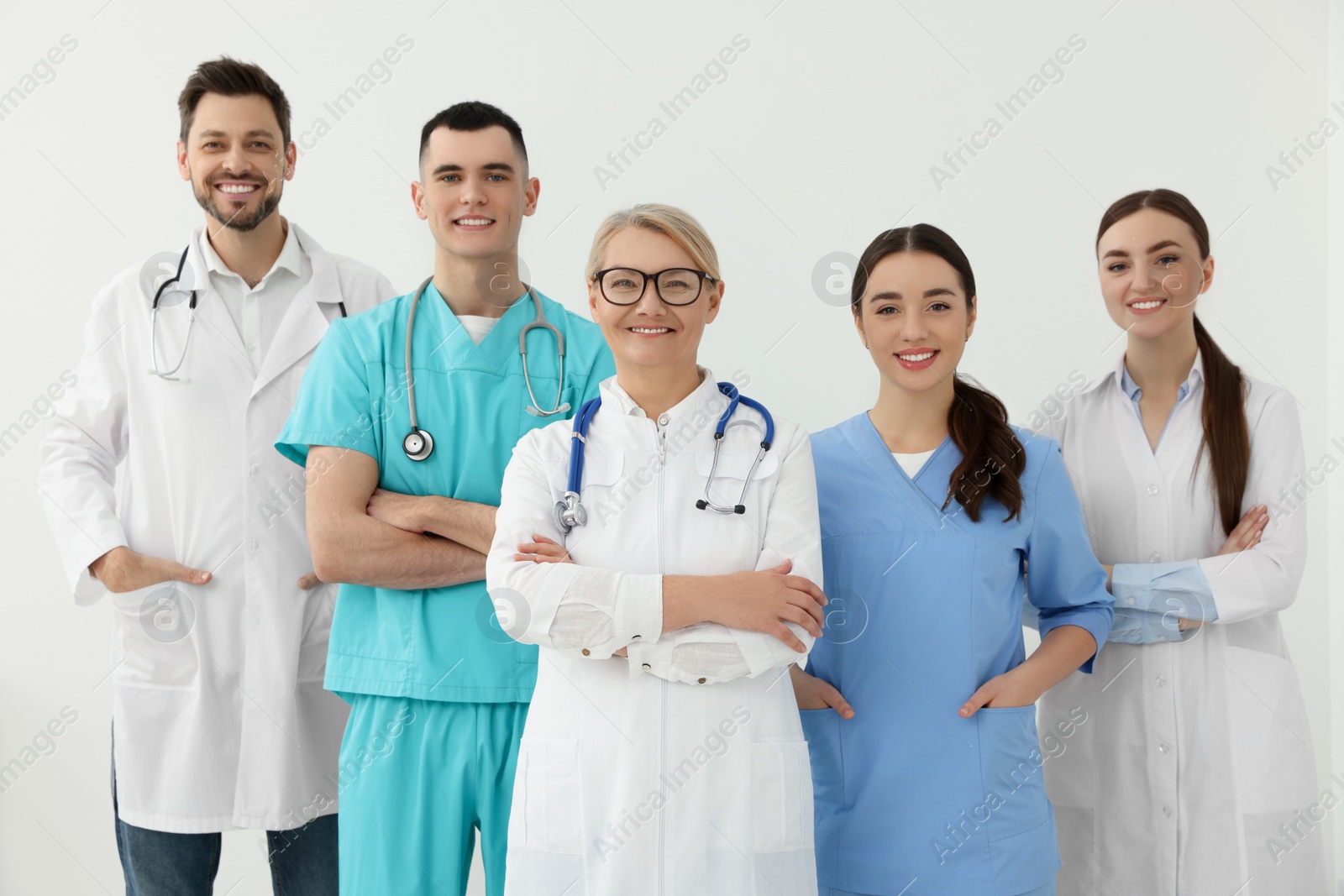 Photo of Portrait of medical doctors wearing uniforms indoors