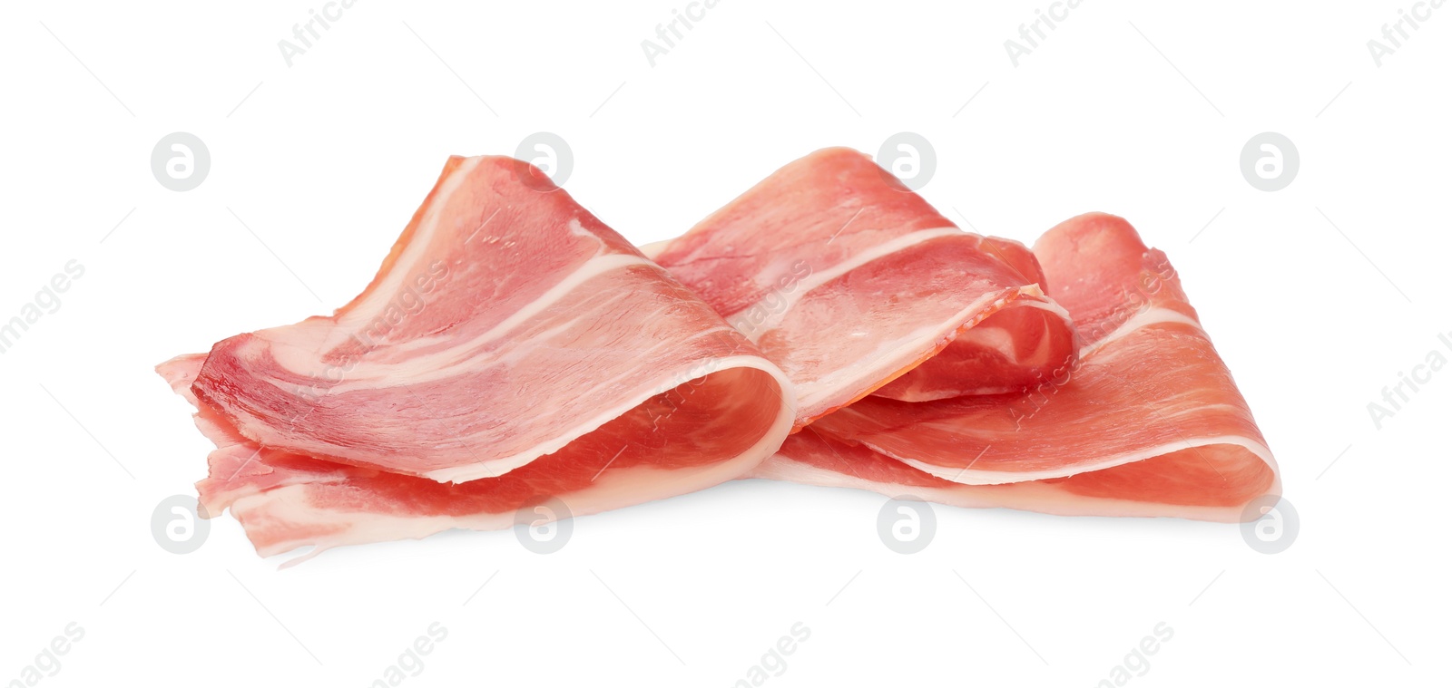 Photo of Slices of delicious jamon isolated on white