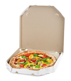 Photo of Delicious vegetable pizza in cardboard box on white background