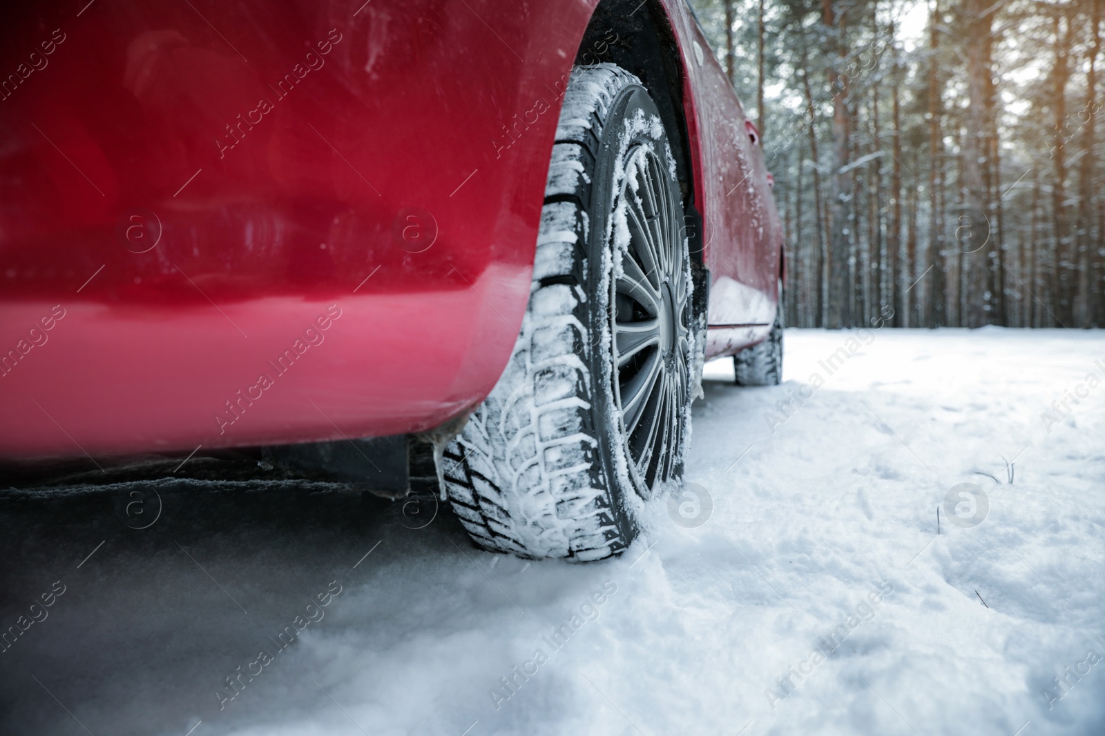 Photo of Car on snowy road, closeup. Space for text