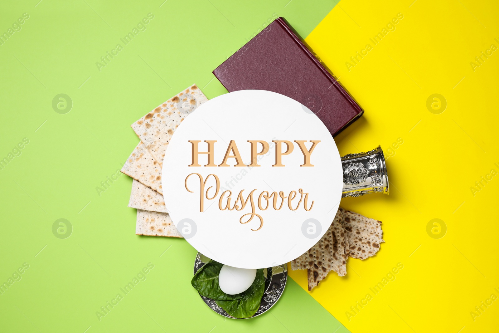 Image of Symbolic Passover items and card on color background, flat lay. Pesah celebration