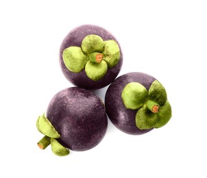 Photo of Delicious ripe mangosteen fruits on white background, top view