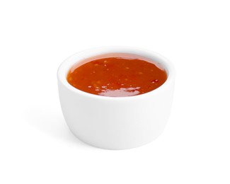 Photo of Spicy chili sauce in bowl isolated on white