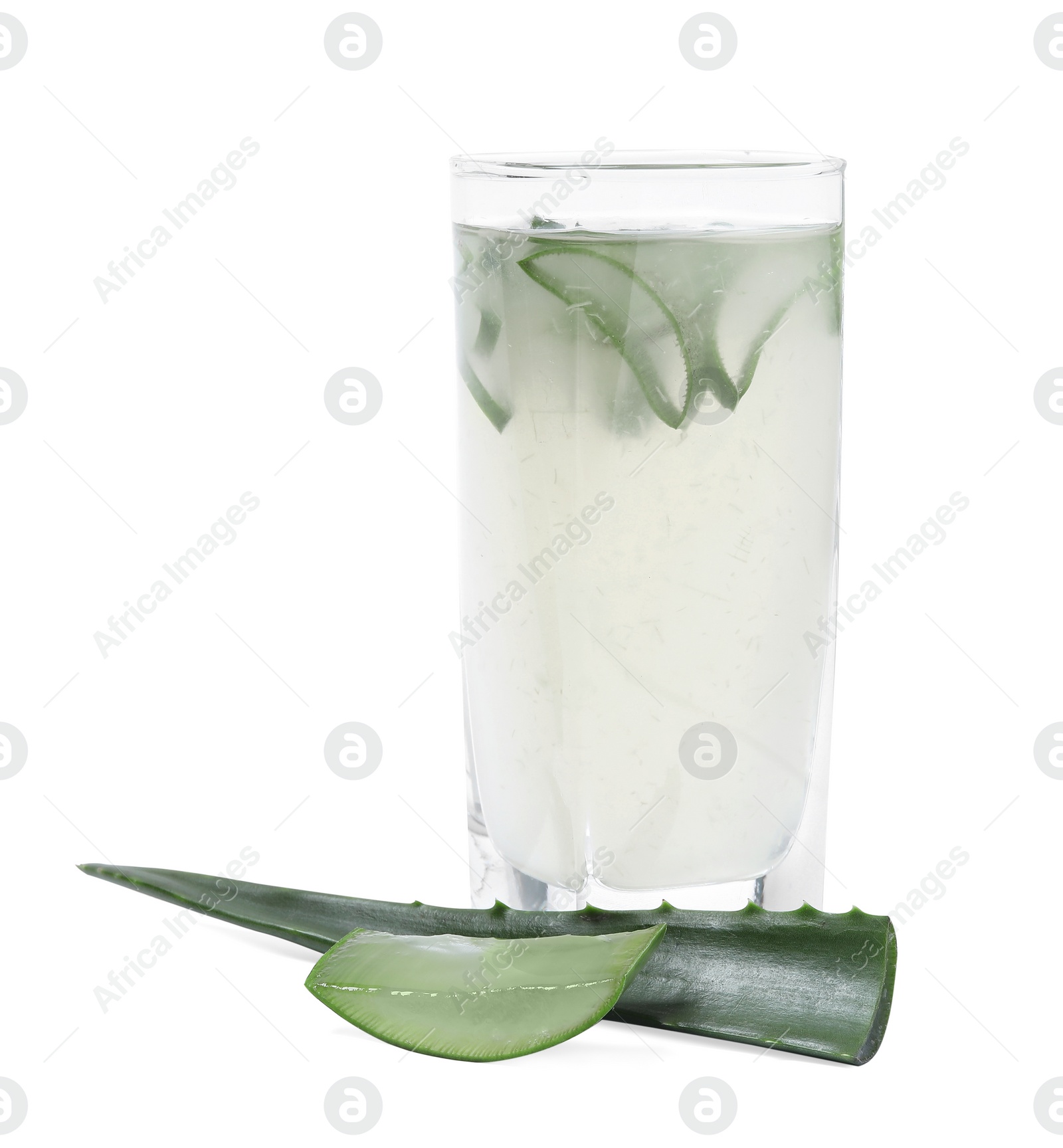 Photo of Fresh aloe juice in glass and leaves isolated on white