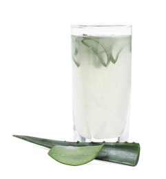 Photo of Fresh aloe juice in glass and leaves isolated on white