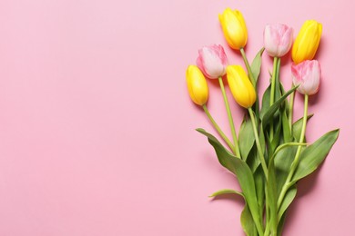 Photo of Beautiful colorful tulip flowers on pink background, flat lay. Space for text