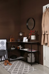 Hallway interior with console table and stylish decor