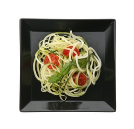 Tasty zucchini pasta with tomatoes and basil isolated on white, top view