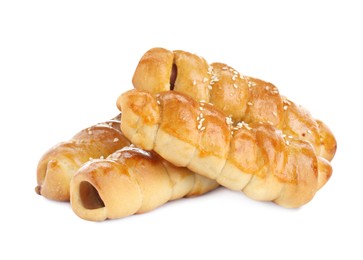 Photo of Many delicious sausage rolls isolated on white