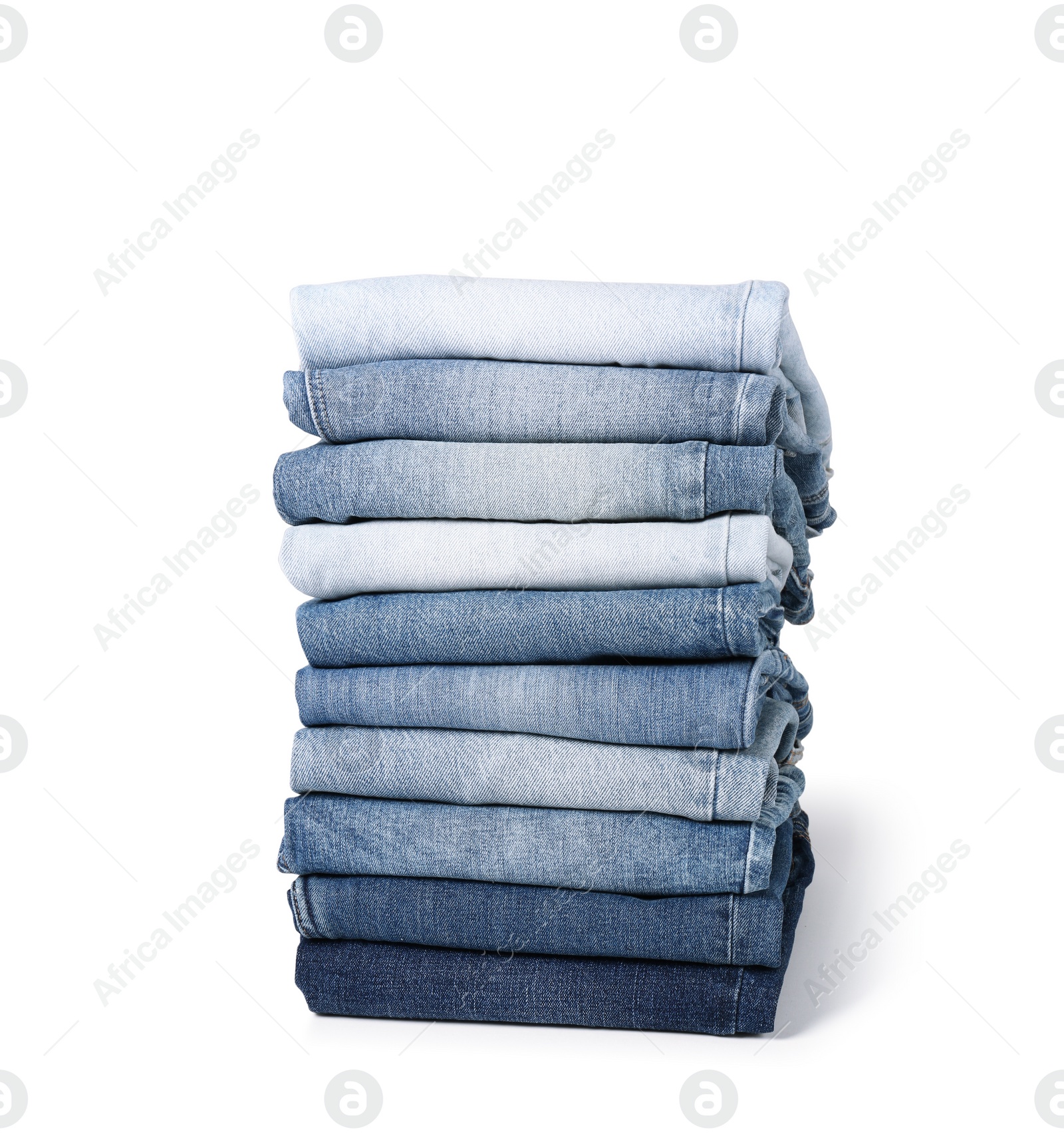 Image of Stack of different folded jeans isolated on white