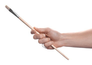 Man holding paint brush on white background, closeup