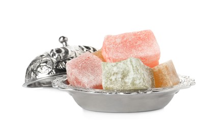 Photo of Turkish delight dessert in plate on white background