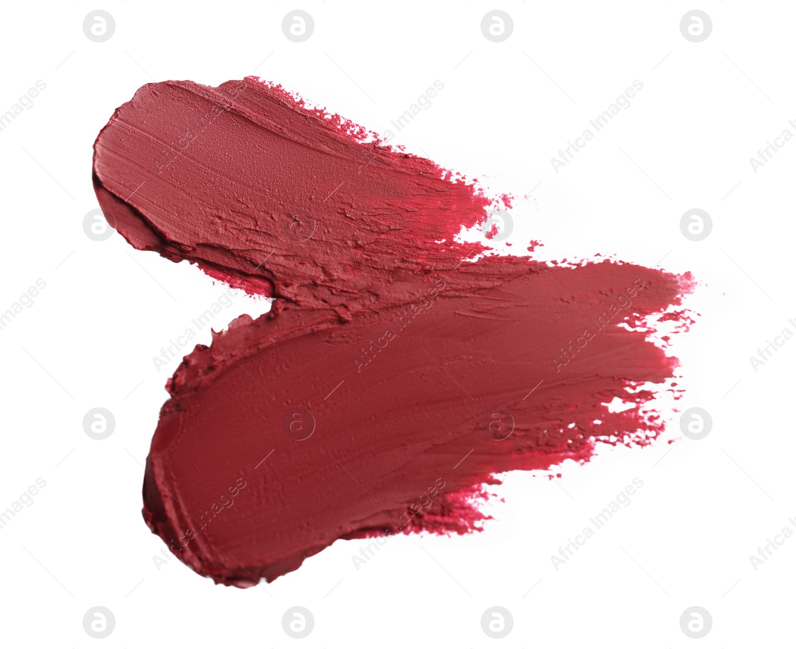 Photo of Smears of bright lipstick on white background, top view