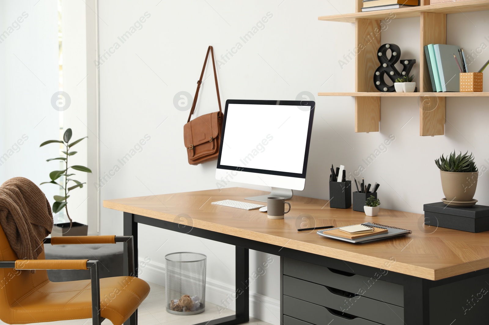 Photo of Stylish room interior with modern comfortable workplace