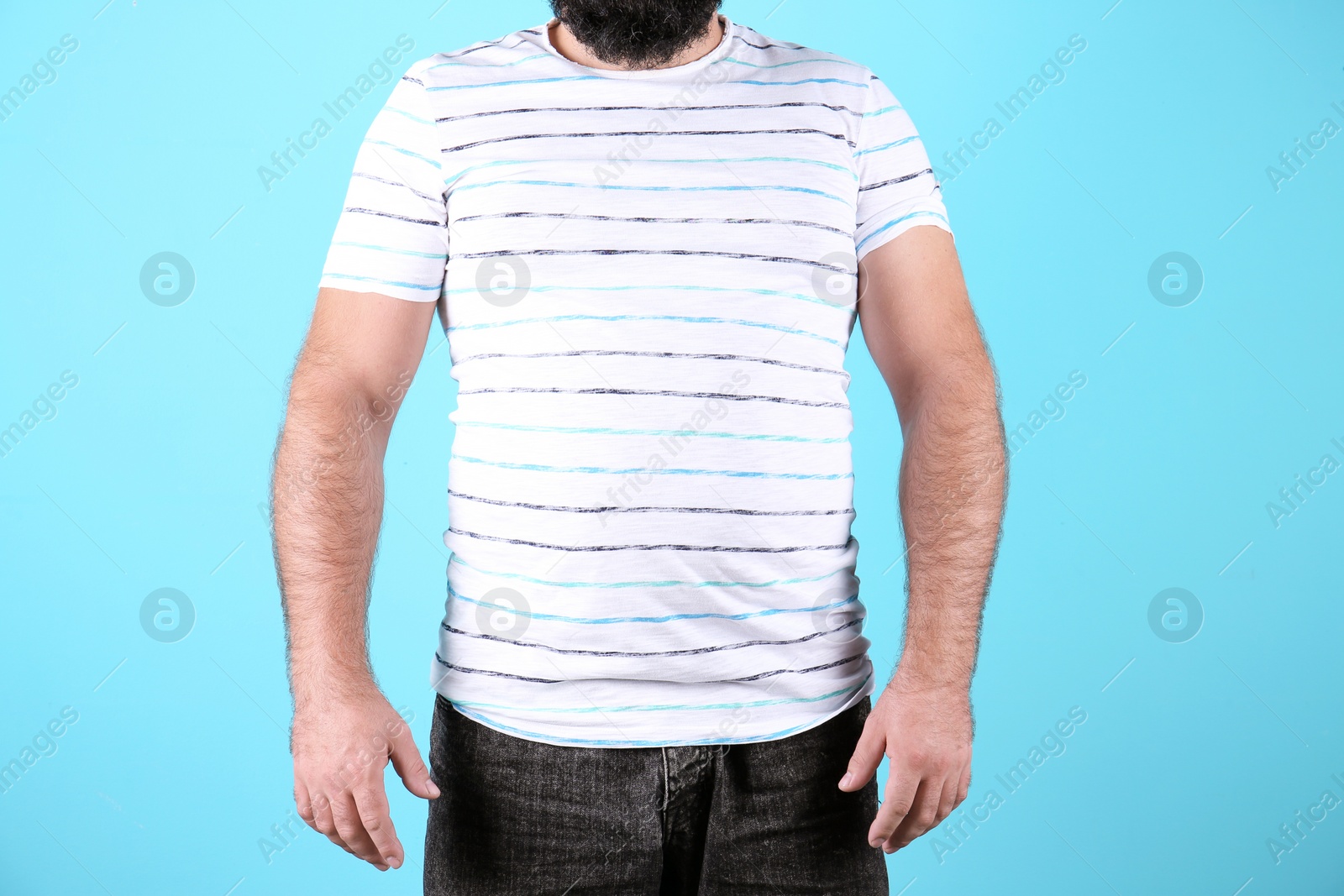 Photo of Fat man on color background, closeup. Weight loss