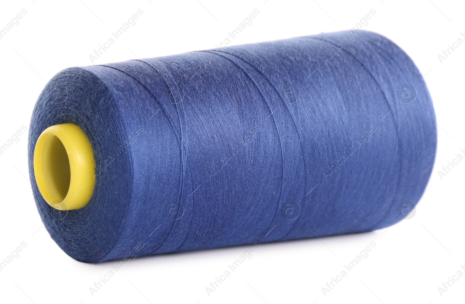 Photo of Spool of blue sewing thread isolated on white