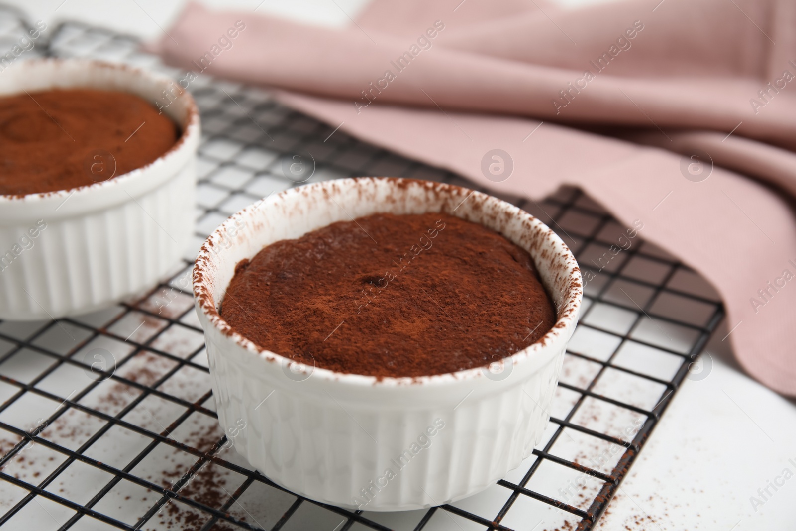 Photo of Delicious fresh chocolate fondant on white table, closeup