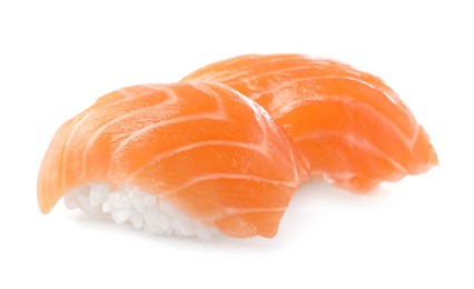 Photo of Delicious nigiri sushi with salmon isolated on white