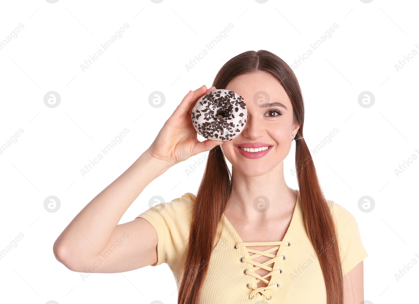 Photo of Beautiful young woman with donut on white background