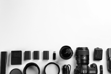 Photo of Composition with photographer's equipment and accessories on white background, top view