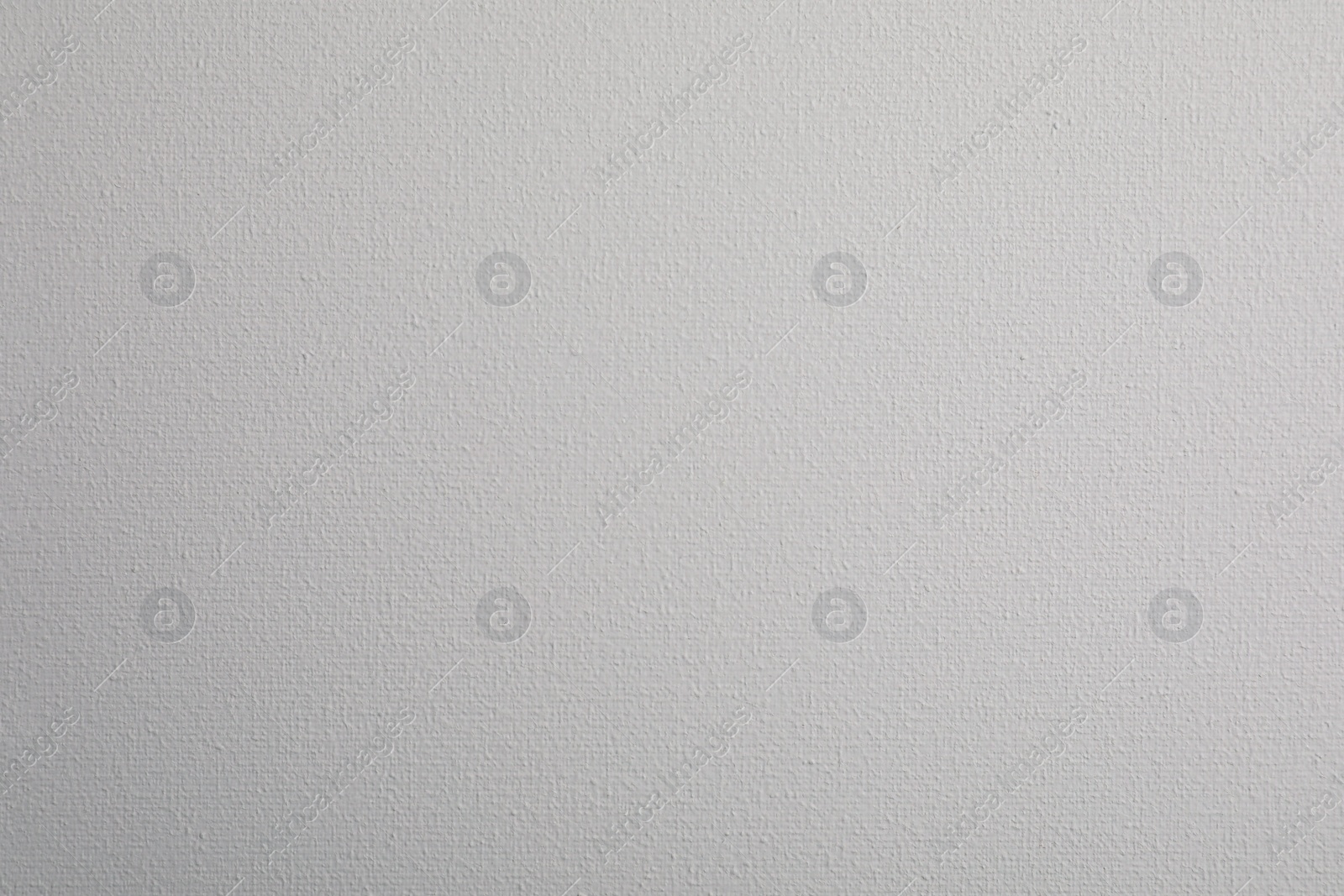 Photo of Blank white canvas as background, closeup view