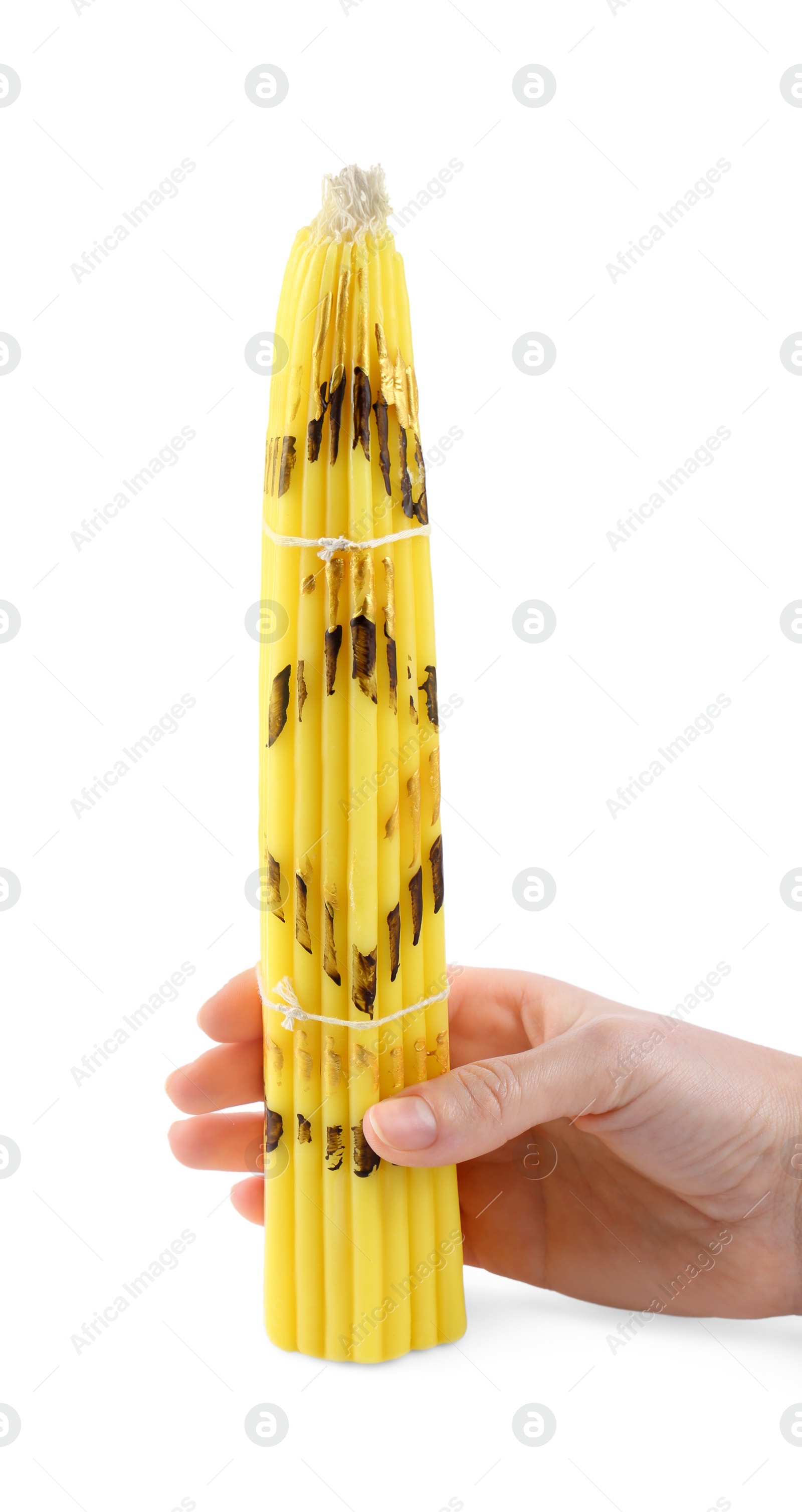 Photo of Woman holding bunch of church candles on white background, closeup