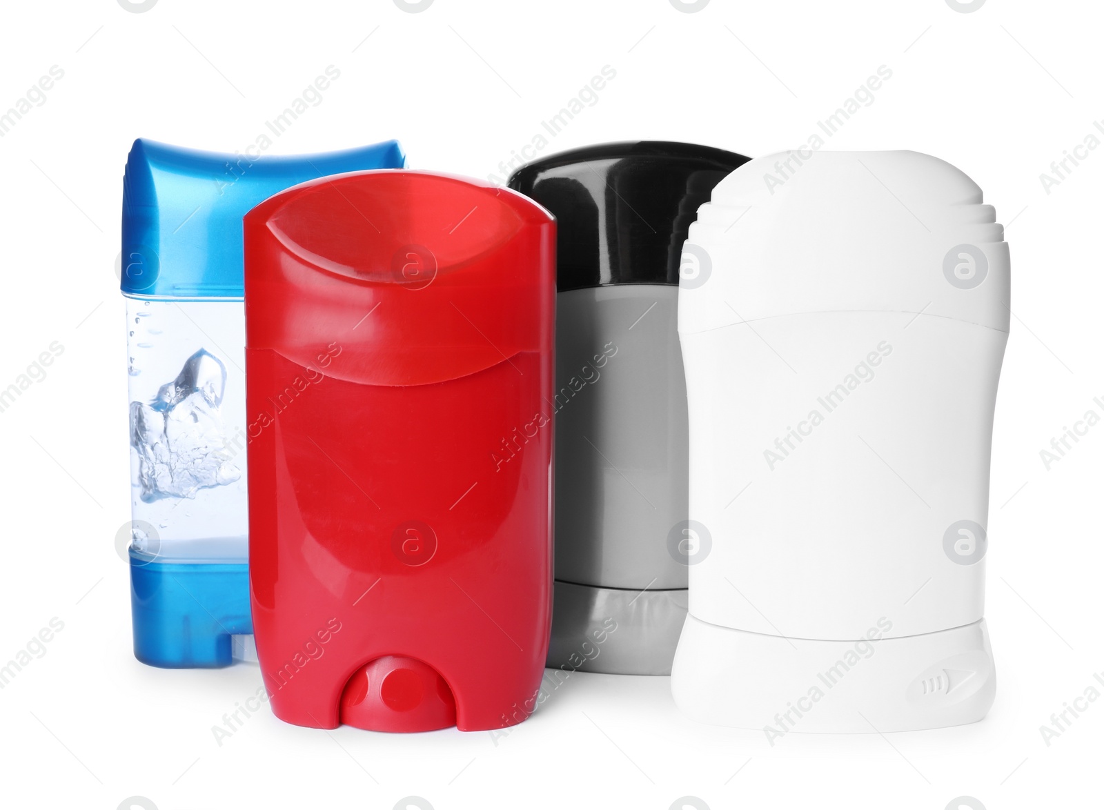 Photo of Different natural male deodorants on white background. Skin care