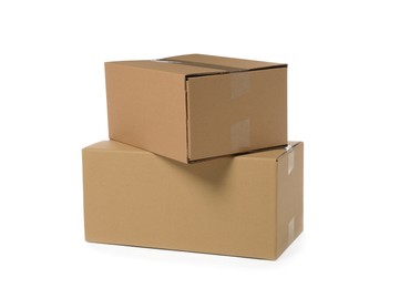 Photo of Two closed cardboard boxes isolated on white. Delivery service