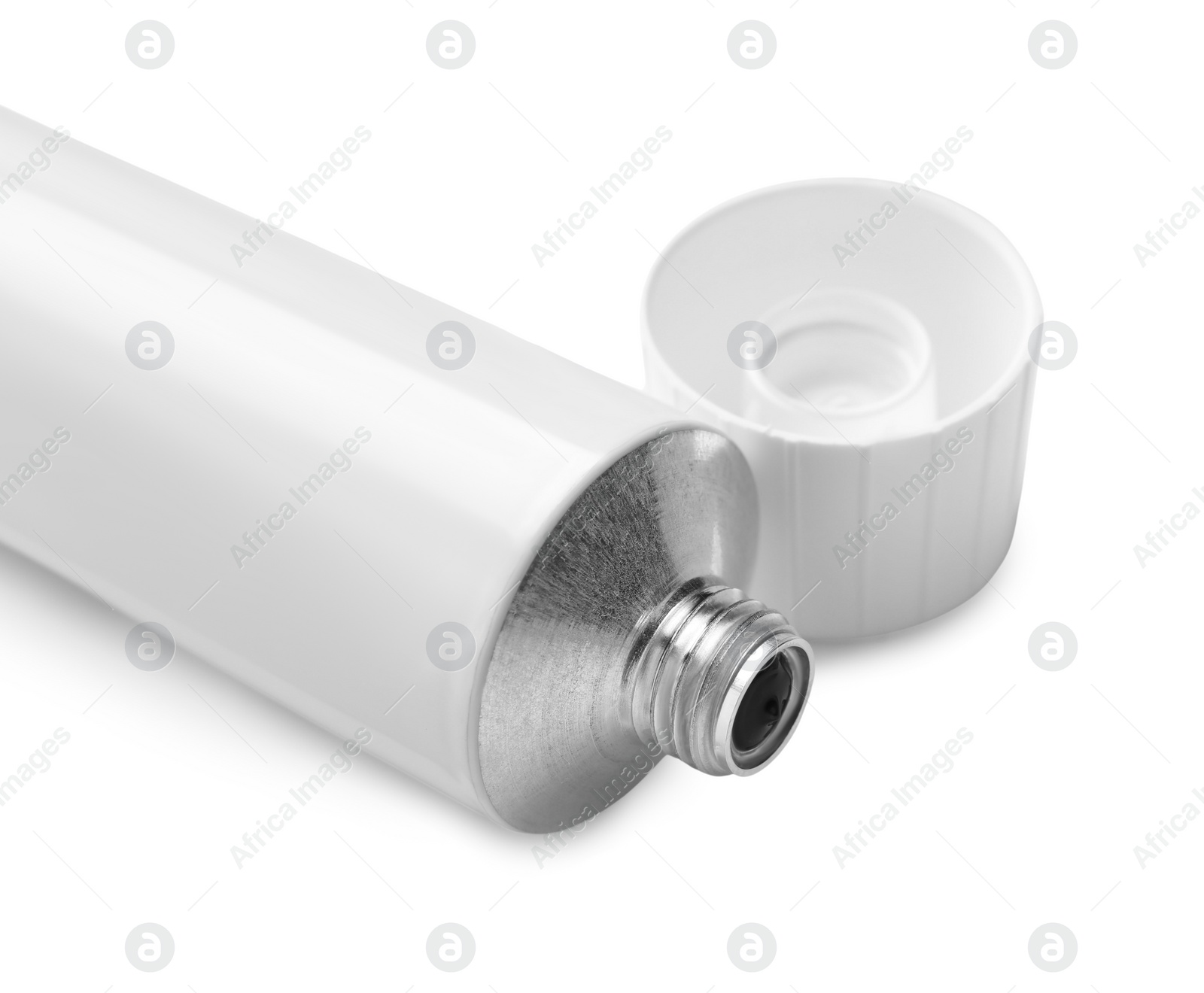 Photo of Open tube of ointment isolated on white, closeup. Space for text