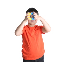 Photo of Cute child playing with colorful blocks on white background