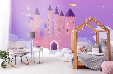 Image of Kid's room interior with comfortable bed and other furniture. Fairytale themed wallpapers with castle