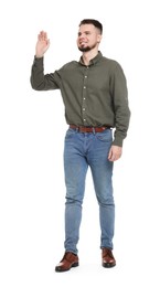 Photo of Man in shirt and jeans waving hand on white background