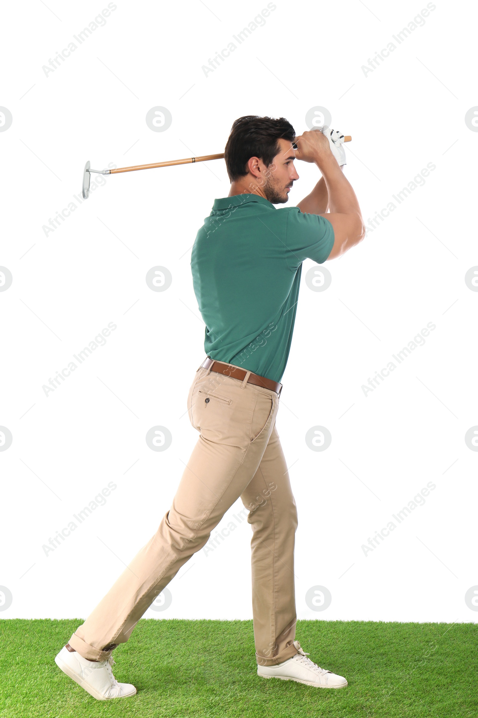 Photo of Young man playing golf on white background