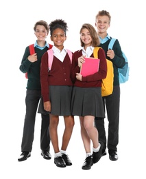 Happy pupils in school uniform on white background