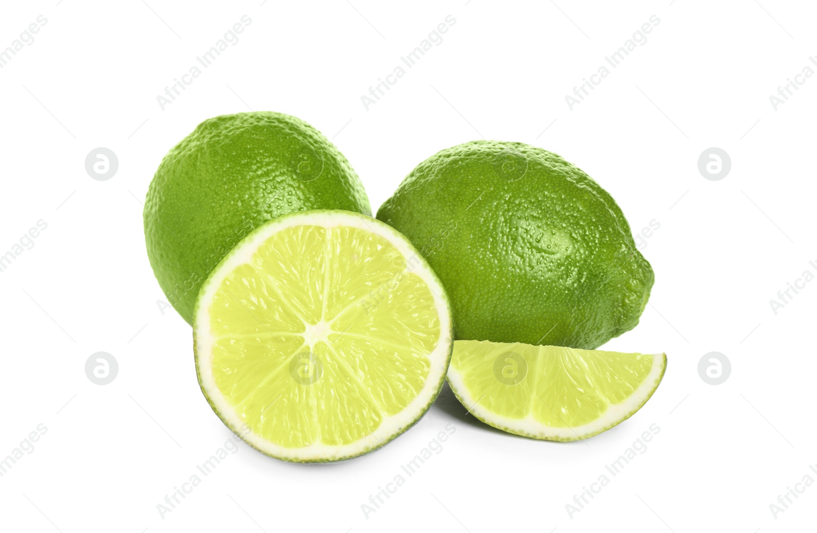 Photo of Fresh ripe green limes isolated on white