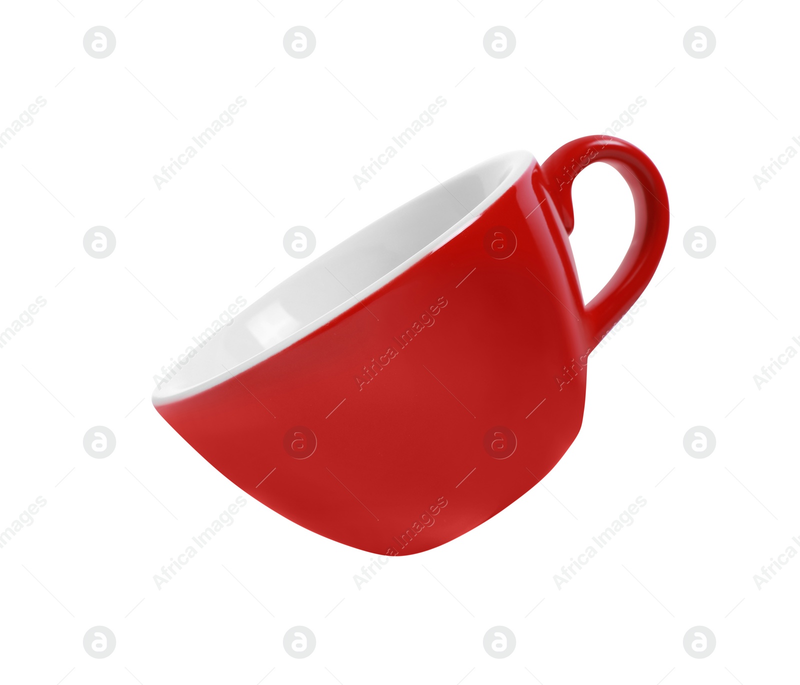 Photo of One red ceramic cup isolated on white