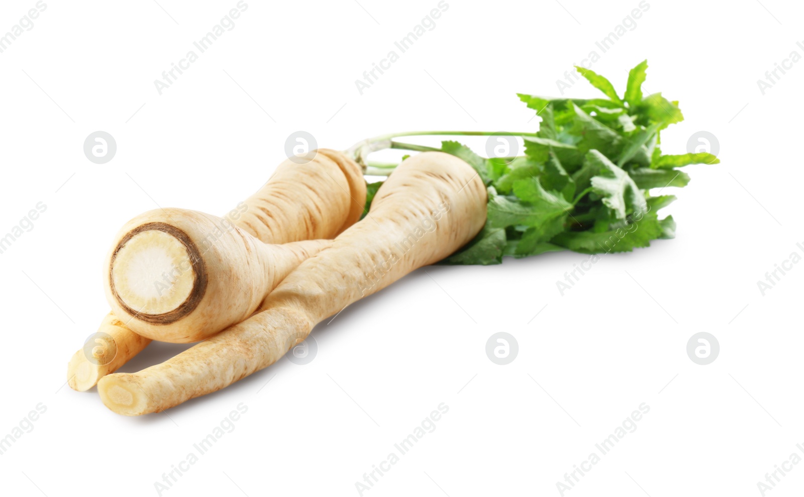 Photo of Tasty fresh ripe parsnips on white background