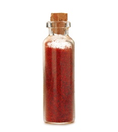 Photo of Glass bottle with spice on white background