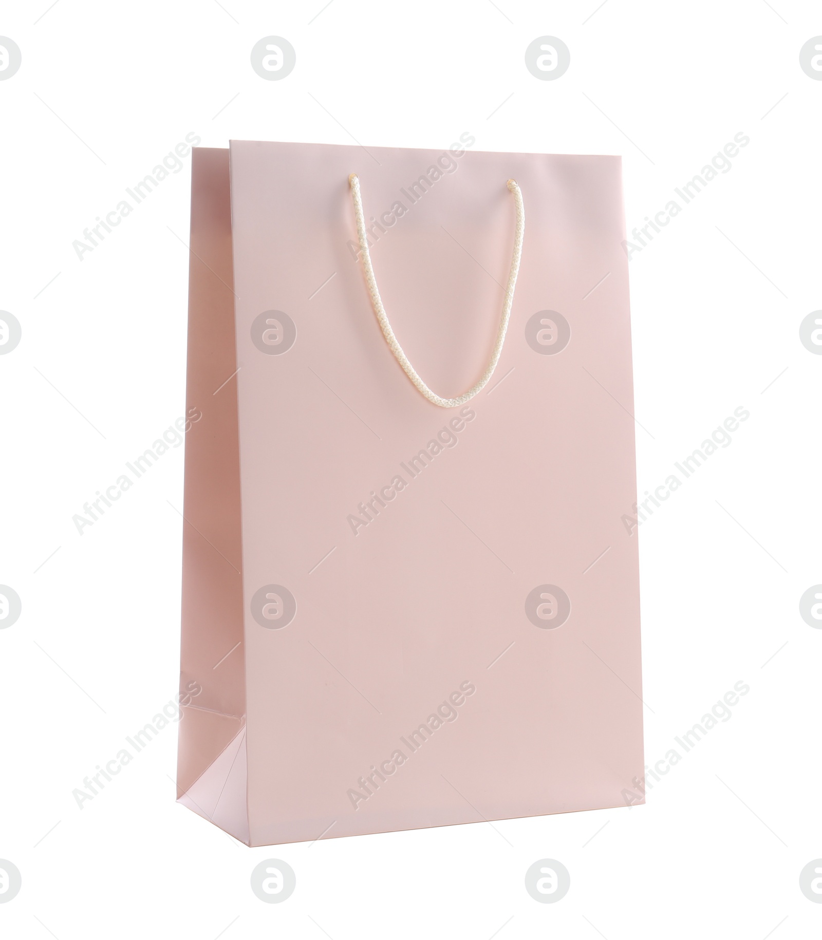 Photo of Pink paper shopping bag isolated on white