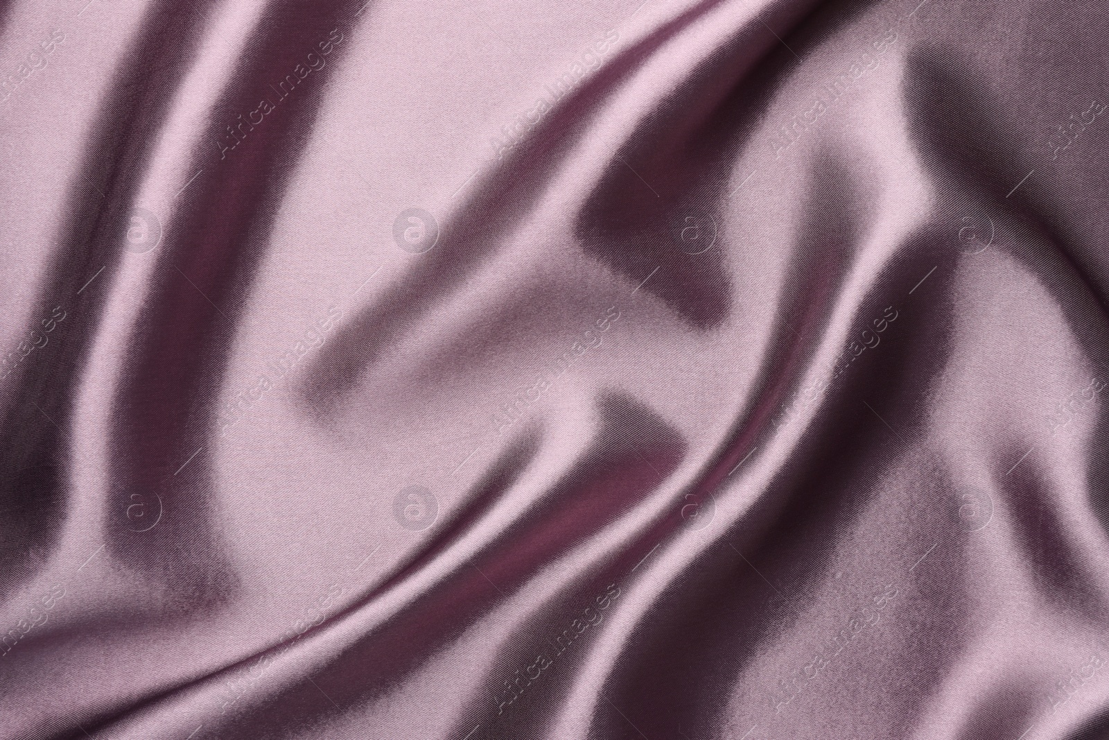 Photo of Texture of beautiful silk fabric as background, closeup