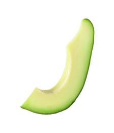 Photo of Slice of ripe avocado isolated on white