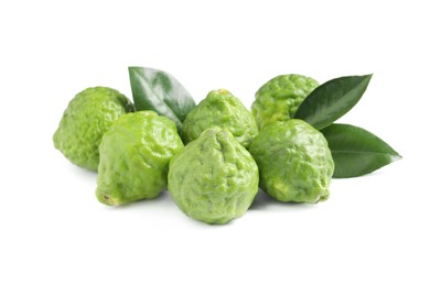 Fresh ripe bergamot fruits and leaves on white background