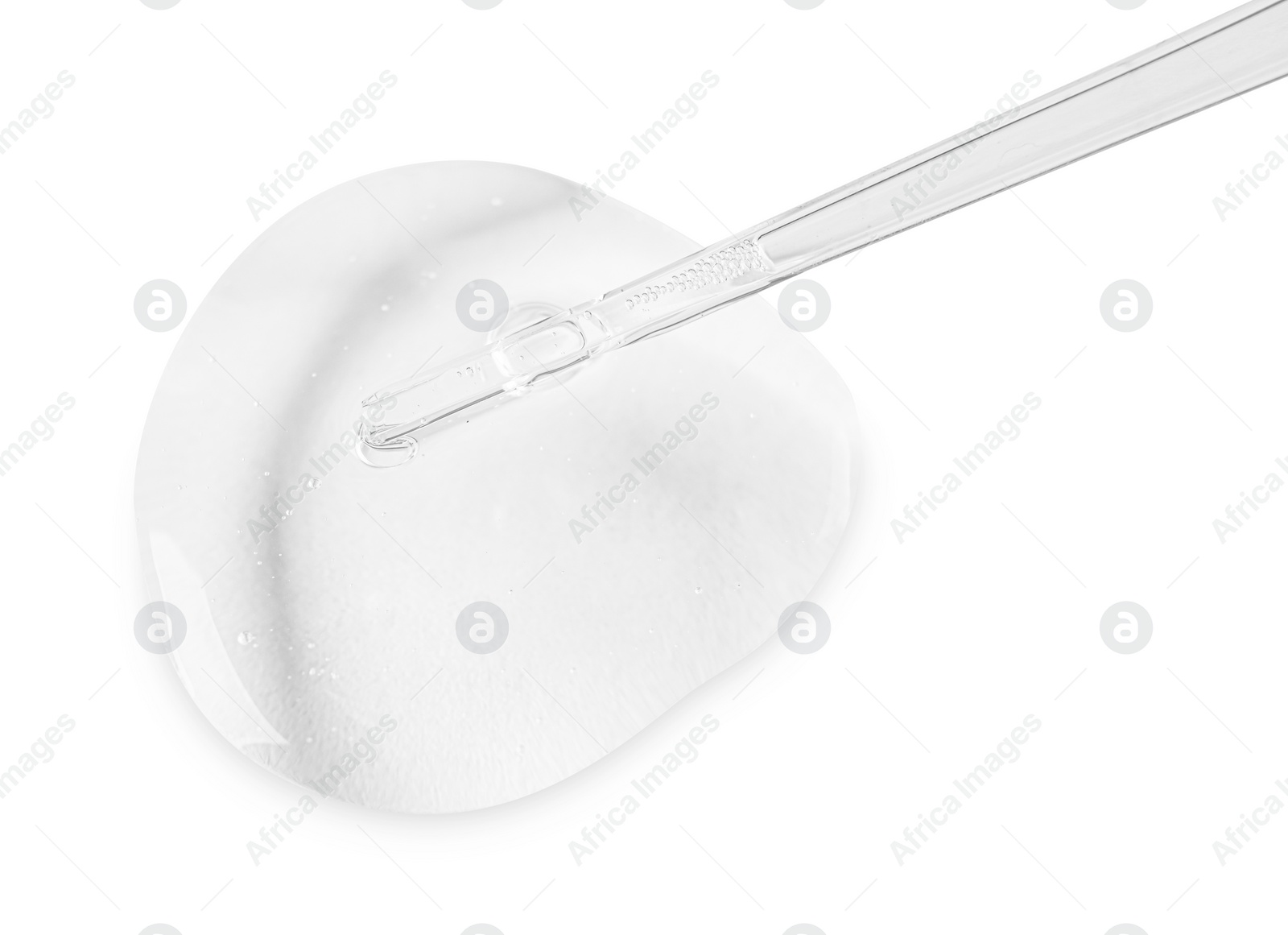 Photo of Glass pipette and transparent liquid isolated on white