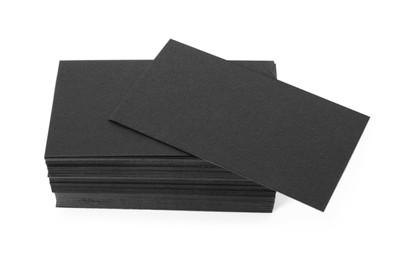 Photo of Many blank black business cards isolated on white. Mockup for design